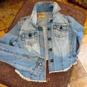 Super cute . True size small Jean jacket, premium quality.